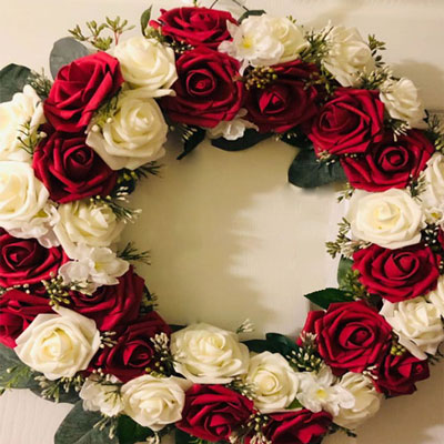 Click here for more on Flower Arrangement with Red and White Roses