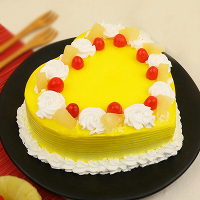 Click here for more on Heart shape pineapple cake - 1kg