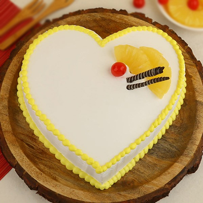 Click here for more on Heart shape pineapple cake - 1kg