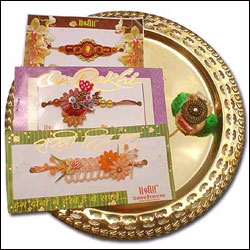 Click here for more on Three Fancy Rakhis With Brass Thali