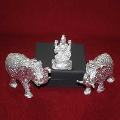 Click here for more on Goddess Laxmi Idol with White Metal Elephant Pair
