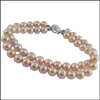 Click here for more on 2STRING PINK PEARL BRACELET - JPAUG-170