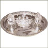 Click here for more on A complete Silver pooja set